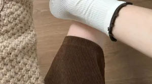 Comfortable cotton mid-tube socks with contrast ruffled edges, perfect for daily casual wear.