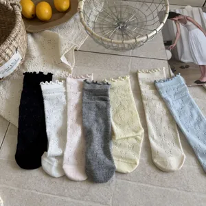 Women cute ruffle lace mesh mid-tube socks with sweet bowknot design for spring and summer.