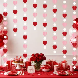 Detailed view of Valentine's Day hanging paper heart garlands scene setup with table decor.