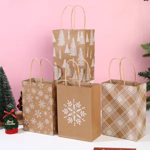Kraft paper gift bags with Christmas tree snowflake and plaid holiday party designs and handles.