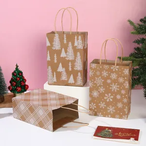 Christmas kraft paper gift bags with festive tree snowflake and plaid prints for party treats.