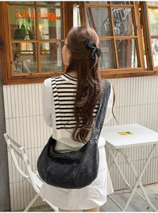 Casual denim shoulder bag for women, trendy large capacity slouchy pleated crossbody bag.