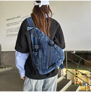 Vintage washed denim sling chest bag for women, multi-functional casual crossbody bag detail view.