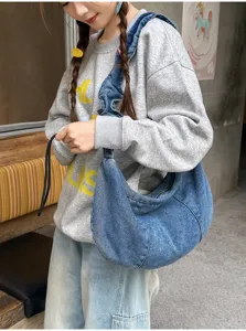 Casual denim hobo shoulder bag for women, stylish pleated crossbody bag with large capacity.