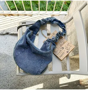 Casual denim hobo shoulder bag for women, trendy pleated design with large capacity daily use.