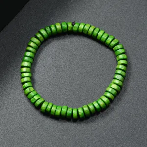 Green wooden bead bracelet detail view showing retro ethnic style disc beads for daily wear.