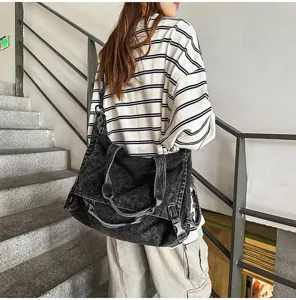 Retro washed denim crossbody bag detail, large capacity shoulder handbag for women daily wear.