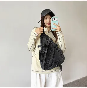 Vintage washed denim chest bag for women, large capacity casual cross-body sling bag style.
