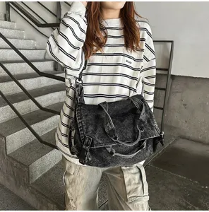 Vintage washed denim crossbody bag for women, large capacity retro motorcycle shoulder tote.