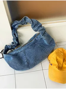 Casual denim shoulder bag for women, featuring stylish pleated strap and large capacity.