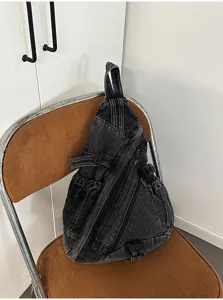 Washed denim sling chest bag featuring vintage retro style, large capacity crossbody bag.