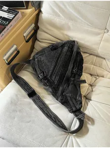 Vintage washed denim chest bag for women, retro crossbody sling bag with multiple pockets.