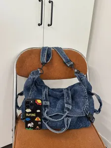 Vintage washed denim shoulder bag for women, large capacity retro motorcycle crossbody bag.