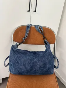 Vintage washed denim shoulder bag for women, large capacity slouchy hobo crossbody bag.