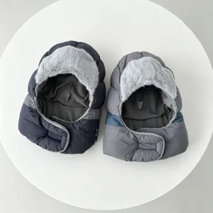 Close-up detail of the thermal puffer trapper hat with soft plush fleece lining and ear flaps.