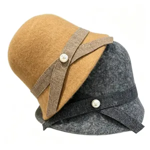 Detailed view of women autumn winter wool bucket hat, vintage elegant cloche hat texture.