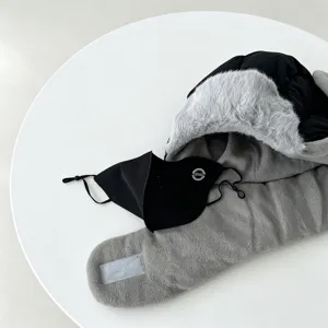 Windproof winter thermal trapper hat with fleece lining and matching face mask in black and grey.