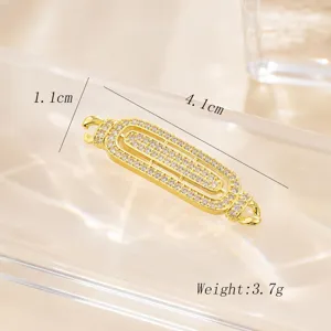 Gold plated double hanging jewelry connector clasp detail with sparkling micro pave cubic zirconia.