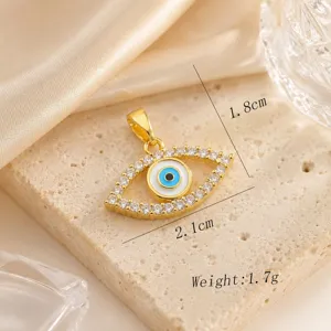 Exquisite evil eye pendant featuring sparkling cubic zirconia and 18K gold plated copper.