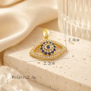 Evil Eye pendant detail, gold plated cubic zirconia charm, jewelry close up display