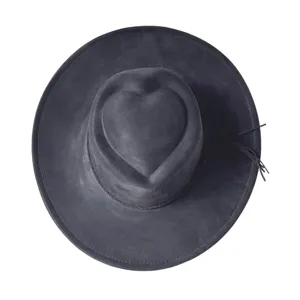 Black suede western cowboy hat featuring unique heart crown and side tassels for party.