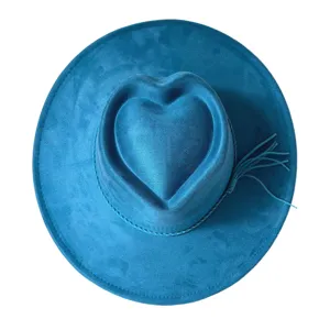 Blue suede western cowboy hat with a unique heart shaped crown, wide brim and side tassels.