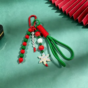 Christmas themed woven keychain with colorful beads, festive bag charm and cute snowflake pendant.