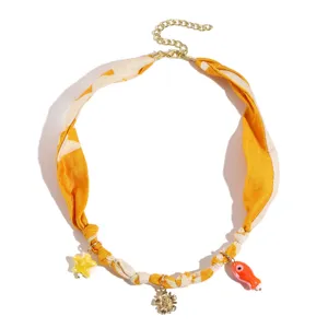 Trendy yellow fabric scarf necklace with cute gold charms clavicle chain for women