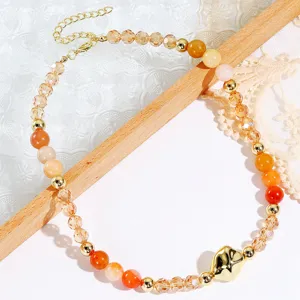 Vintage style color-block beaded clavicle chain necklace with cute gold pendant for women.