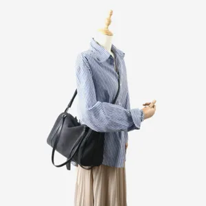 Sac bandoulière Boston en toile cuir minimaliste, sac quotidien polyvalent pour femme chic.
