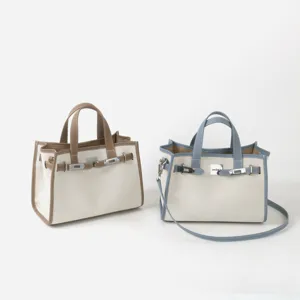 Sac cabas en toile et cuir, sac à main décontracté avec bandoulière et fermoir.