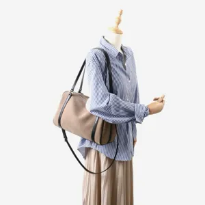 Sac Boston minimaliste en toile et cuir, grand sac porte epaule bandouliere pour travail quotidien.
