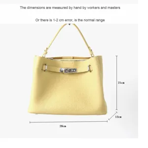 Sac à main fourre-tout en cuir classique avec poignée et fermeture en métal pour femmes.
