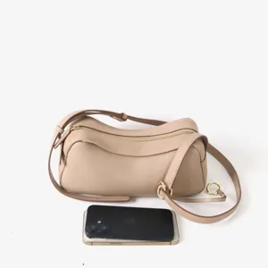 Sac à bandoulière en cuir véritable pour femme, sac à main souple et élégant.