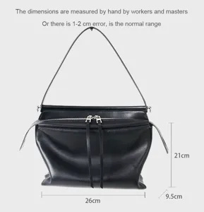 Sac à épaule noir en cuir pour femme, sac besace élégant avec fermeture éclair.