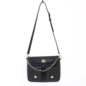 Sac bandoulière élégant en cuir matelassé noir avec chaîne dorée et fermoir métallique.