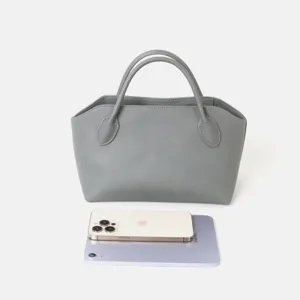 Sac cabas minimaliste en cuir gris avec poignées, sac à main souple en cuir de vache pour le travail.