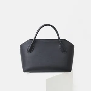 Sac à main noir en cuir véritable avec poignée, design élégant et minimaliste pour femmes.
