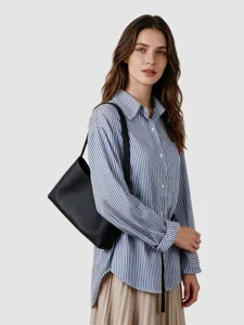 Sac porté épaule noir en cuir véritable pour femme, élégant sac hobo pour le travail.