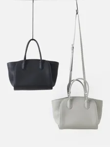 Sac cabas minimaliste en cuir pour femme, grand sac porté épaule classique pour le quotidien.