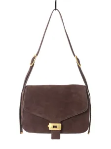 Sac à bandoulière en cuir daim marron pour femme, sacoche élégante avec fermoir métallique.