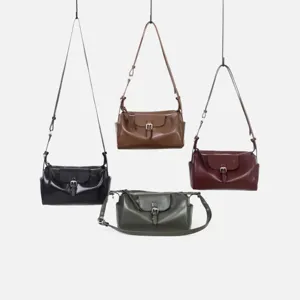 Vista detallada de elegantes bolsos cruzados de cuero para mujer en varios colores.