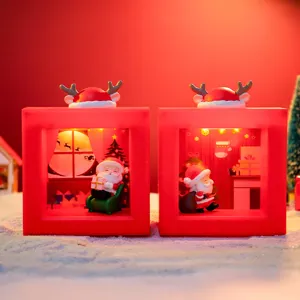 Detailed view of Christmas square night light with cute Santa diorama and festive deer horns.