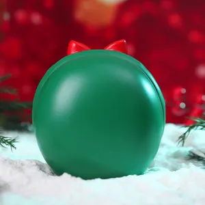 Christmas green ball ornament with red bow for festive desktop holiday gift decoration