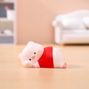 Cute resin pink pig figurine wearing red dress, perfect miniature ornament for car and desktop.
