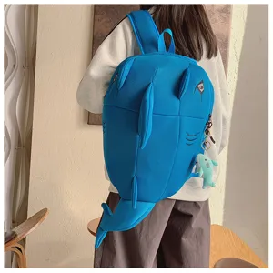 Cute 3D shark shaped canvas backpack for students, fun travel daypack with pendant.