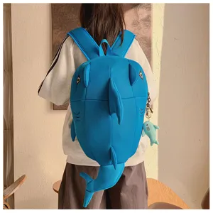 Detail view of a cute 3D blue shark backpack with unique fin and tail design for daily use.