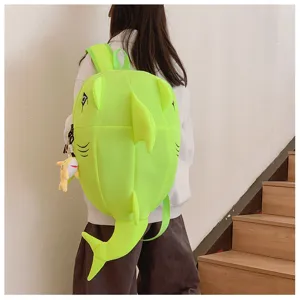 Cute green shark shaped backpack detail, large capacity fashion school bag with fin design.