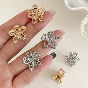 Kleine metallene Blumen-Haarklammern, goldene und silberne Haarklammern für Damen.