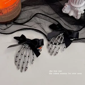 Pinces à cheveux squelette gothique avec nœuds noirs, épingles rétro Halloween pour femmes.